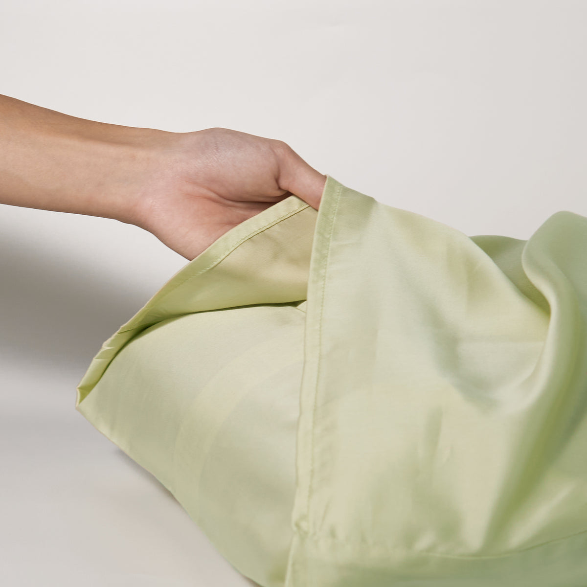Meticulous stitching and a sophisticated "envelope" design