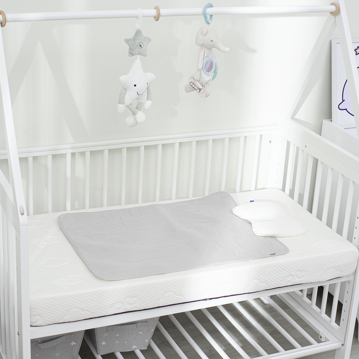 Tấm bảo vệ nệm em bé mini